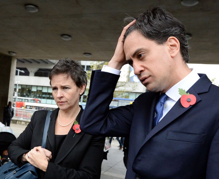 MANCHESTER, ENGLAND - OCTOBER 31:  Labour leader Ed Miliband (R) and Shadow Transport Secretery Mary Creagh (L) speak to members of the public on their way to a meeting with UK council leaders at the Town Hall on October 31, 2014 in Manchester, England. A recent poll has predicted that Labour could lose it's Scottish seats to the Scottish National party next year. (Photo by Nigel Roddis/Getty Images)