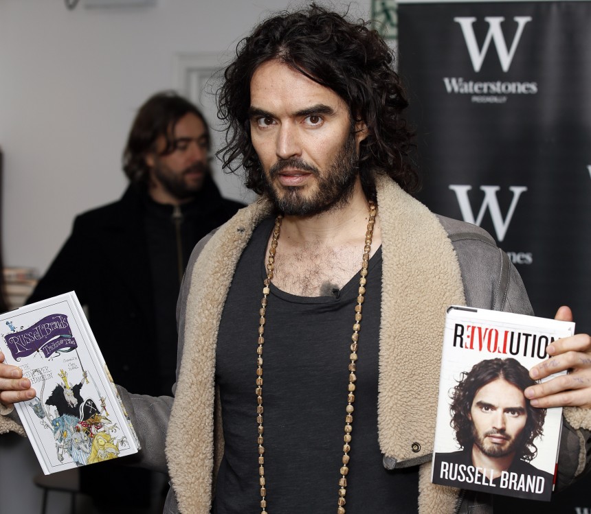 LONDON, UNITED KINGDOM - DECEMBER 5:  Russell Brand pictured during a Book Signing for 'Revolution' at Waterstone's, Picadilly on December 5, 2014 in London, England. (Photo by Alex Huckle/Getty Images)