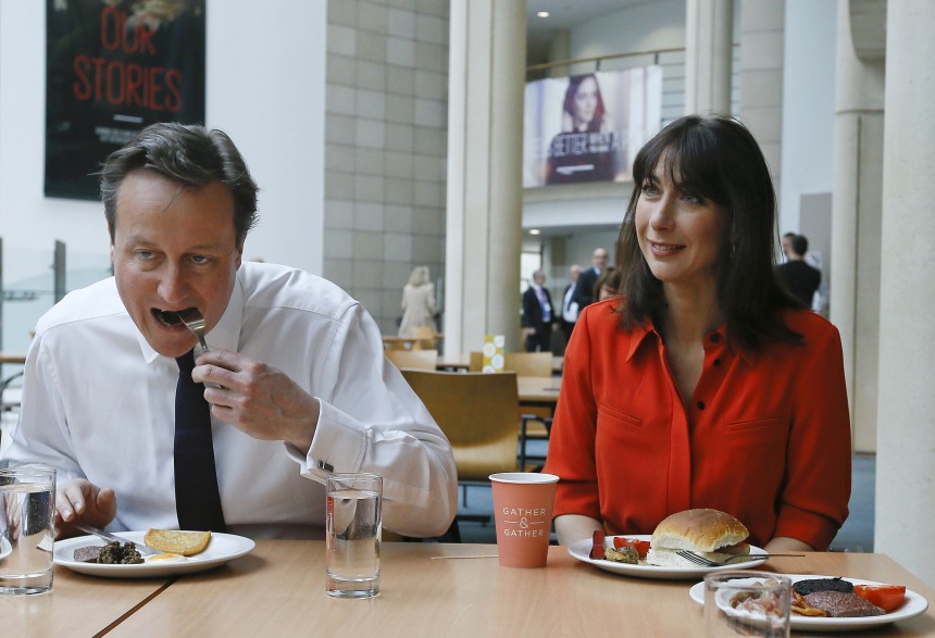 EDINBURGH, SCOTLAND -  APRIL 07: British Prime Minister David Cameron and his wife Samantha eat breakfast during a visit to financial firm Scottish Widows on April 7, 2015 in Edinburgh, United Kingdom. Britain goes to the polls in a General Election on May 7. (Photo by Kirsty Wigglesworth - WPA Pool/Getty Images)