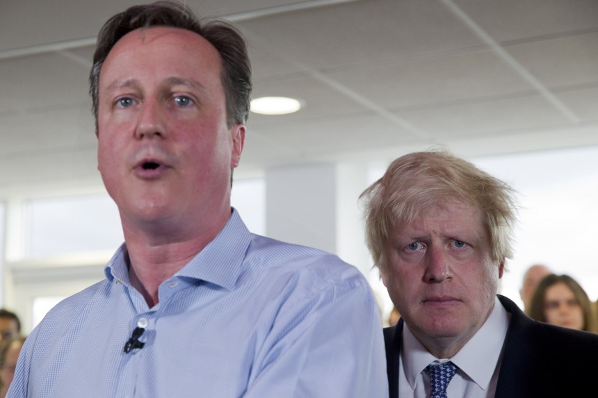 London Mayor Boris Johnson (R) and British Prime Minister David Cameron speak at a Conservative party election rally in Hendon in north London on May 5, 2015. Britain's political leaders today began a final push for votes ahead of Thursday's knife-edge election, even as they prepared for the likelihood of protracted coalition talks once polls close.  AFP PHOTO / JUSTIN TALLIS        (Photo credit should read JUSTIN TALLIS/AFP/Getty Images)